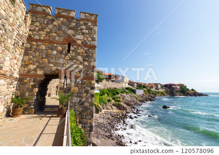 sozopol, bulgaria - aug 09, 2015: southern fortress wall and tower. balkan fort. sunny morning. popular tourist attraction. late antique and medieval town. picturesque waterfront 120578096