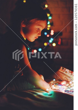 Little boy during the Magical Christmas night 120578381