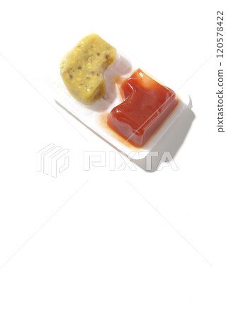 Ketchup and mustard in potion containers photographed on a white background 120578422