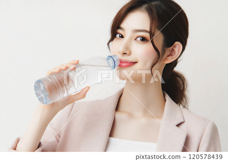 Young Japanese woman drinking water 120578439