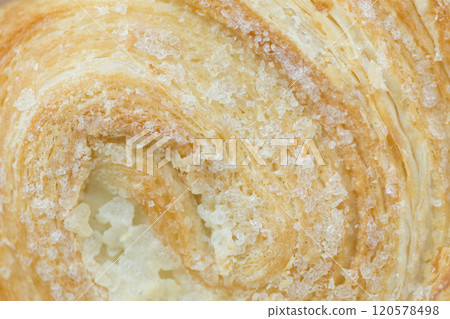 Puff pastry swirls with sugar. 120578498