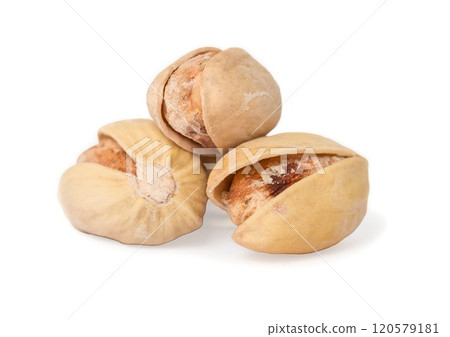 salted pistachio nuts isolated on white 120579181