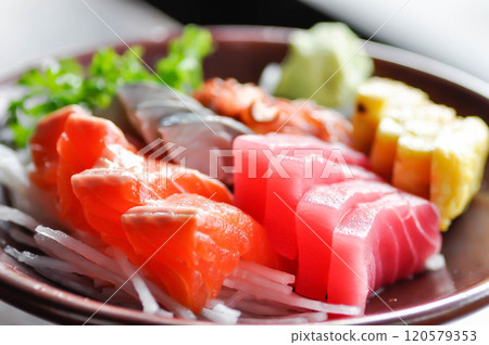 sashimi or raw salmon , Akami and raw tuna or raw mackerel and kanikama and wasabi or raw fish 120579353