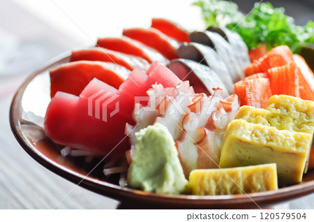 sashimi or raw salmon , Akami and raw tuna or raw mackerel and kanikamaand wasabi or raw fish 120579504