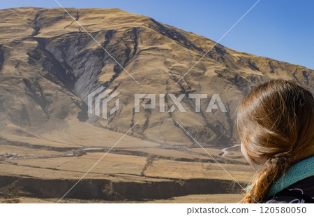 A girl enjoying the view from the Quebrada de Escoipe, Salta, Argentina A girl enjoying the view from the Quebrada de Escoipe, Salta, Argentina 120580050
