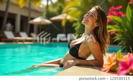 Seductive Woman in Black Bikini Lounging on Pool Edge in Tropical Resort Seductive Woman in Black Bikini Lounging on Pool Edge in Tropical Resort 120580315