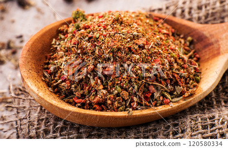 Dry Rub Spice on a Vintage Spoon,wooden table Dry Rub Spice on a Vintage Spoon,wooden table 120580334