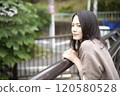 A woman walking 120580528