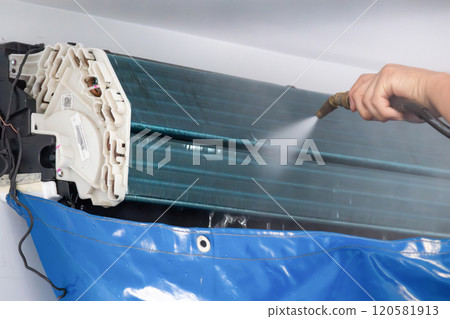 air conditioning cleaning service with water spray 120581913