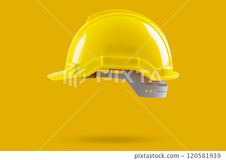 Safety construction helmet on yellow background Safety construction helmet on yellow background 120581939