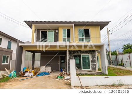 construction residential new house in progress at building site construction residential new house in progress at building site 120581956
