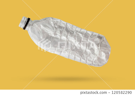 recycled plastic bottle isolated on yellow background recycled plastic bottle isolated on yellow background 120582290