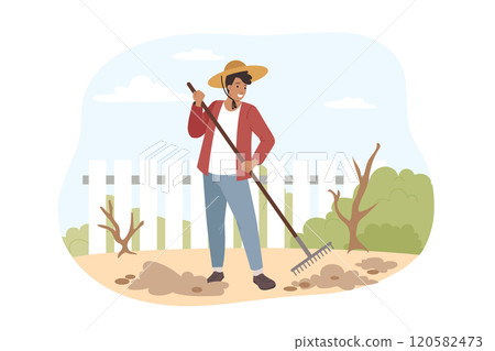 Positive man farmer takes care of territory of country house, uses rake to plant trees 120582473