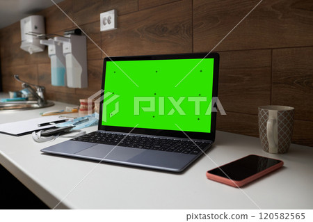 Displaying Digital Workspace with Laptop and Smartphone Displaying Digital Workspace with Laptop and Smartphone 120582565