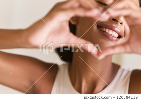 Dental Care. Woman Framing Face With Hands Showing Heart Gesture of Joy 120584119