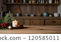 Kitchen blurred background with an empty wooden table or counter, Christmas decorations, and lights, selective focus, for product presentation. 120585011