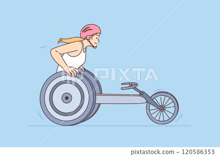 Woman participates in wheelchair race during paralympic games, demonstrating vitality 120586353
