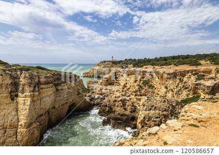 Portuguese coast in Benagil, Algarve, Portugal. Peninsula. Seven Hangging Valleys Trail. Portuguese coast in Benagil, Algarve, Portugal. Peninsula. Seven Hangging Valleys Trail. 120586657