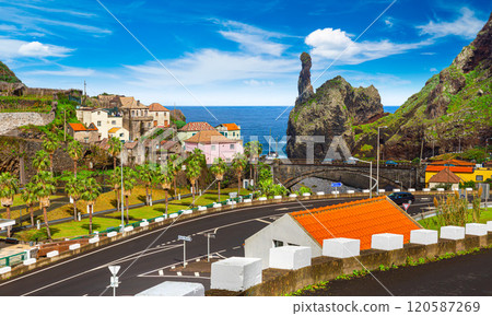 Tall lava rocks in ocean, islet towers in Ribeira da Janela, Madeira Island, Portugal Tall lava rocks in ocean, islet towers in Ribeira da Janela, Madeira Island, Portugal 120587269