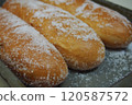 Fried bread with sugar (facing right) 120587572