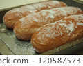 Fried bread with sugar (facing left) 120587573
