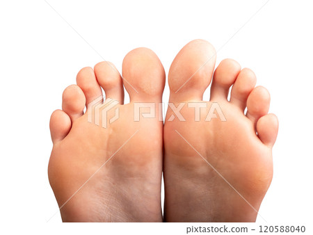 Barefoot woman posing. Smooth, soft feet with neat nails, feminine beauty and health focus. Skin 120588040