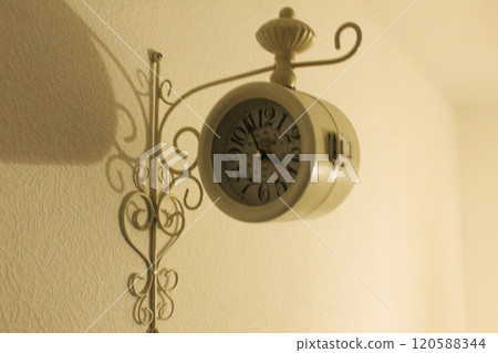 Decorative antique white clock. Clock in the apartment Decorative antique white clock. Clock in the apartment 120588344