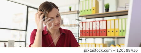 Female office employee with hard migraine at workplace Female office employee with hard migraine at workplace 120589410