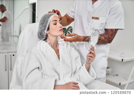 Enjoying a relaxing skincare treatment at a modern spa in the afternoon Enjoying a relaxing skincare treatment at a modern spa in the afternoon 120589870