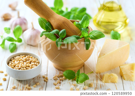 Pesto sauce cooking. Italian basil pesto sauce with culinary ingredients for cooking. Pesto sauce cooking. Italian basil pesto sauce with culinary ingredients for cooking. 120589950
