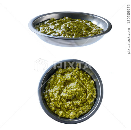 sauce pesto in a stainless steel bowl isolated on white background. sauce pesto in a stainless steel bowl isolated on white background. 120589973