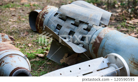 The tail section of a 220 mm rocket for the Uragan rocket fire system on a city flowerbed in Mykolaiv The tail section of a 220 mm rocket for the Uragan rocket fire system on a city flowerbed in Mykolaiv 120590595