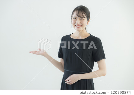 A woman in a black one-piece uniform 120590874