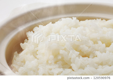 Freshly cooked rice on a white background Freshly cooked rice on a white background 120590976