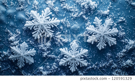 Beautiful frozen snowflakes on a winter background with blue tones and delicate details 120591329