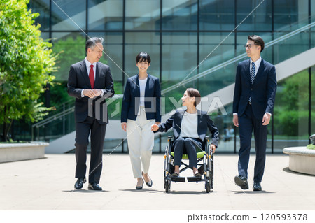 Business wheelchair team walking Business wheelchair team walking 120593378