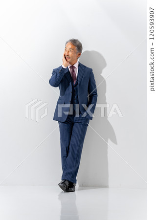 Business senior male portrait vertical 120593907