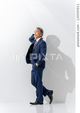 Business senior male portrait vertical 120593911