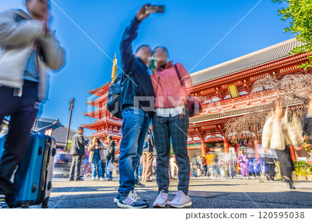 Tokyo cityscape in Japan. Sensoji Temple crowded with foreign tourists. People enjoying taking selfies in various places = 25th Tokyo cityscape in Japan. Sensoji Temple crowded with foreign tourists. People enjoying taking selfies in various places = 25th 120595038
