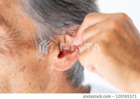 Senior man ear Senior man ear 120595371