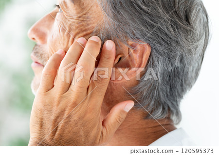 Senior man ear Senior man ear 120595373