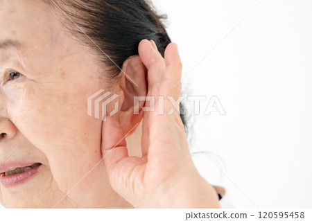 Senior woman ear 120595458