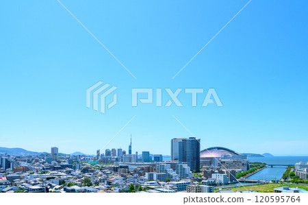 View of Momochihama, Jigyohama, and Fukuoka Tower in Sawara Ward from Tojinmachi and Ohori Park in the morning colors in spring 2024 120595764