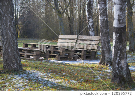 Rustic Wooden Bench Made From Pallets in a Forest Setting Rustic Wooden Bench Made From Pallets in a Forest Setting 120595772