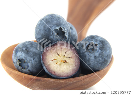 Fresh Blueberries in Wooden Spoon Isolated on White Background 120595777