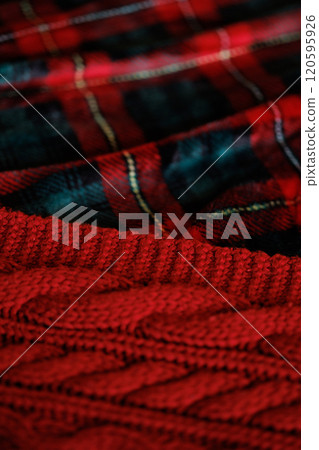 A close up of a red knit sweater 120595926