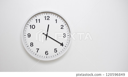 Clean White Clock at 12.20 or 00.20 on Minimalist White Background - Ideal for Time Concepts and Modern Design Clean White Clock at 12.20 or 00.20 on Minimalist White Background - Ideal for Time Concepts and Modern Design 120596849