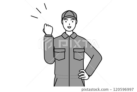 穿著連身褲的機械師正在做拳頭泵 穿著連身褲的機械師正在做拳頭泵 120596997