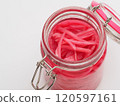 Red pickled ginger in a storage jar 120597161