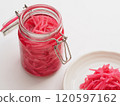 Red pickled ginger in a storage jar 120597162